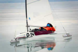 Ice-sailing European championship on Lake Balaton / Lake Balaton / Hungary, ice sailor in full ride on the wind. Ice-sailing European championship on Lake Balaton / Lake Balaton / Hungary, ice sailor in full ride on the wind.